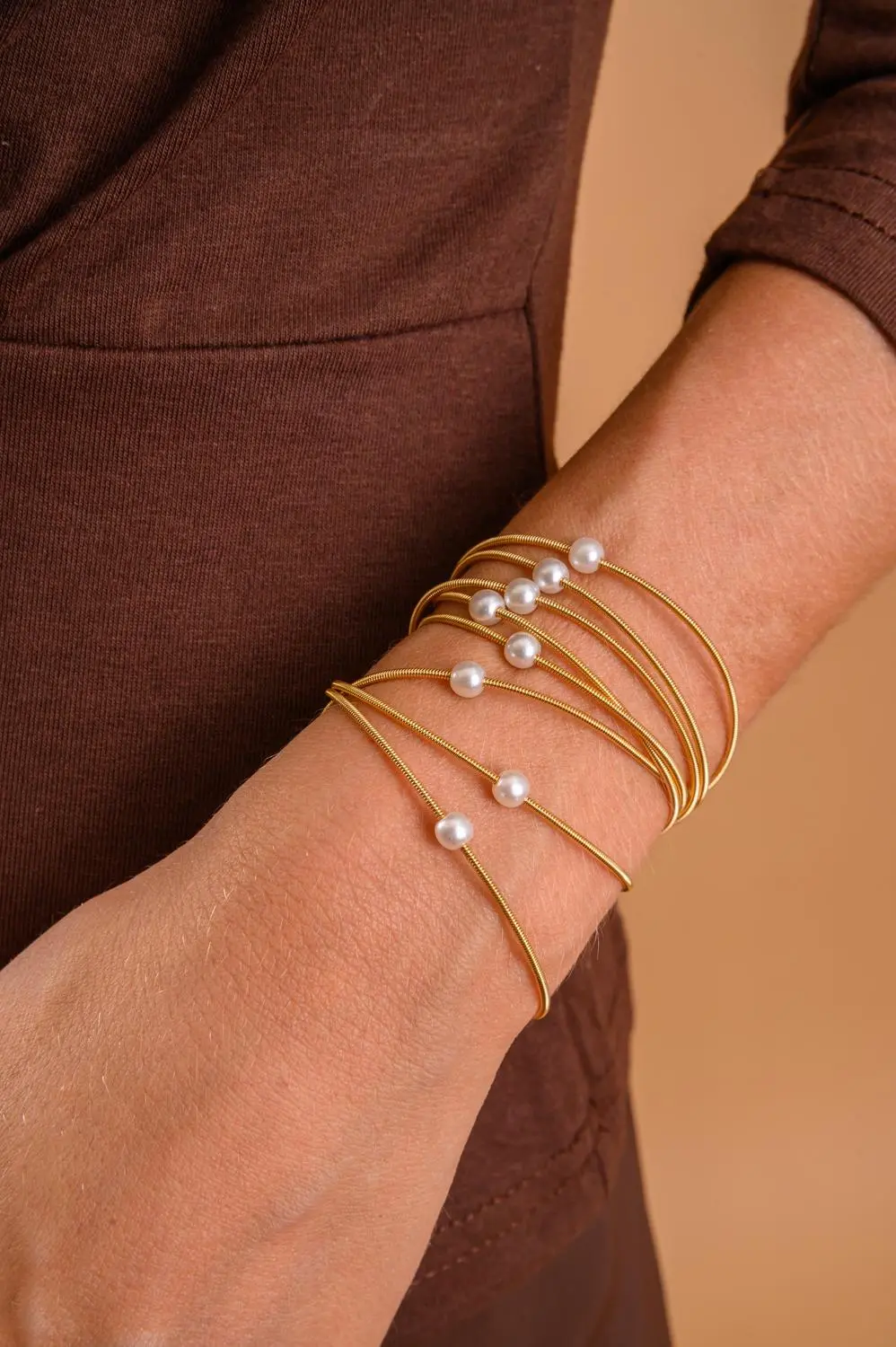 Pulseira Corda de Violão de Pérola com Banho em Ouro 18k