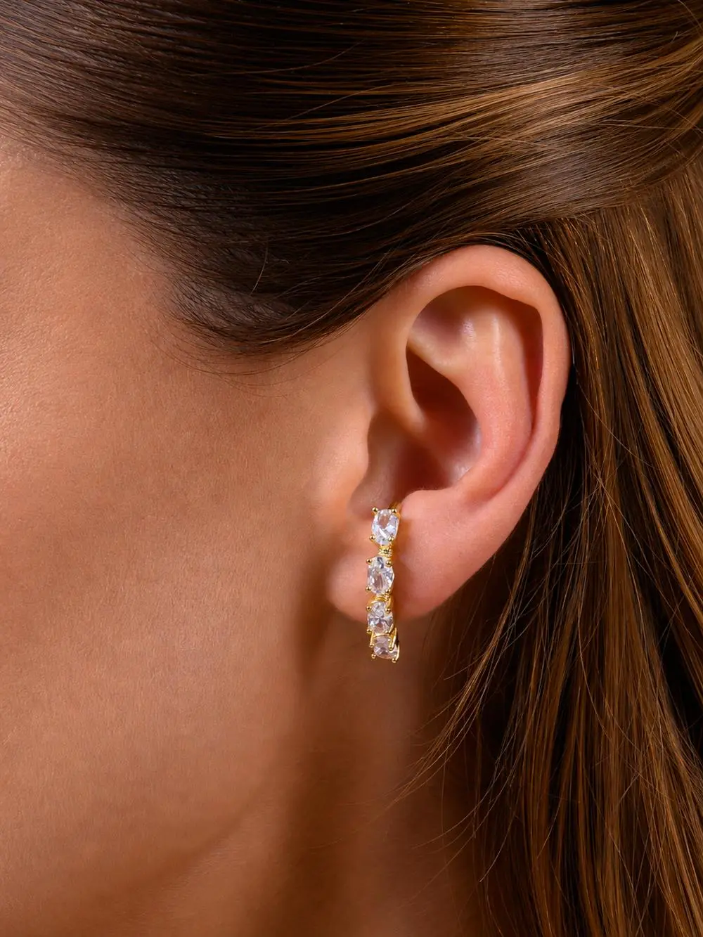 Brinco Ear Hook Quatro Zircônias com Banho em Ouro 18k