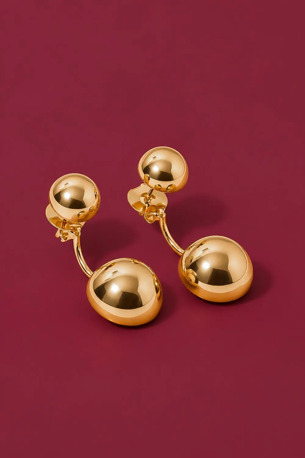 Brinco Duas Meia Bola com Banho em Ouro 18k